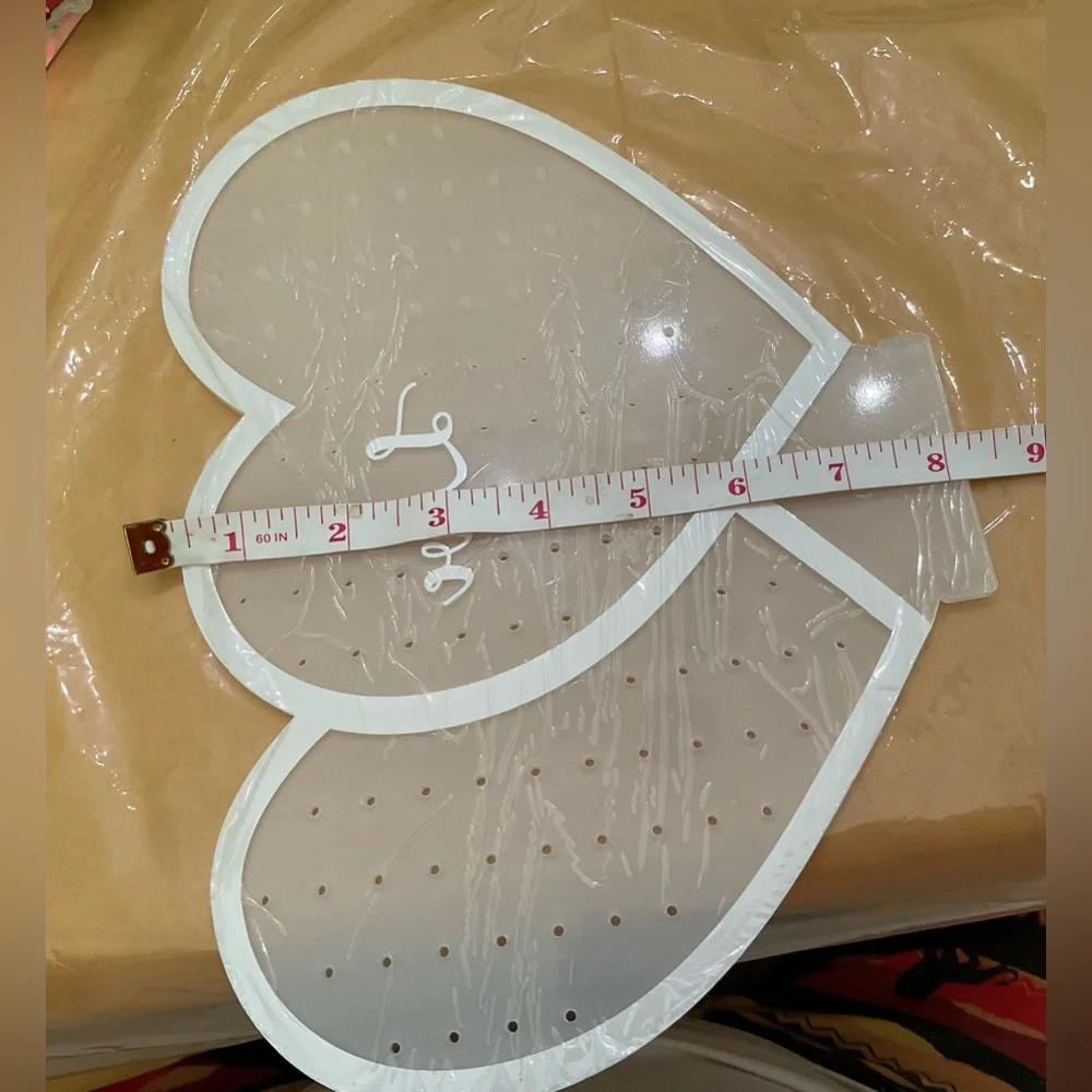 Hutuzldz: Double heart shaped design white acrylic earrings holder/organizer.